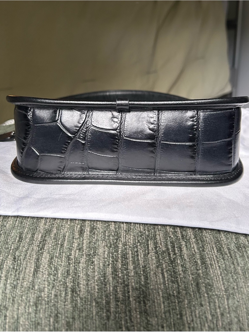 Coach Swinger Bag
Black Croc-Embossed Mini Shoulder Bag with Silver Hardware - Picture 4 of 7
